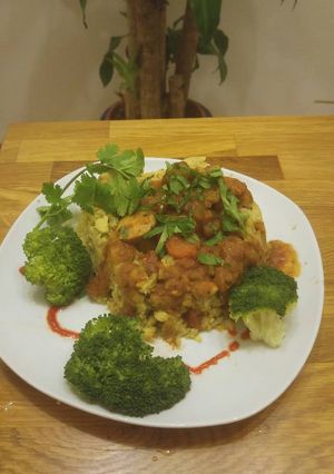 A picture of Mofongo Volcano w/Pollo Guisado (Chicken Stew).