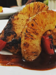 A picture of Pan seared Chicken amd pineapple.