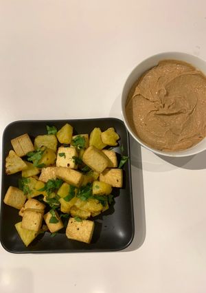 A picture of Roasted Tofu and Pineapple with Peanut Sauce.