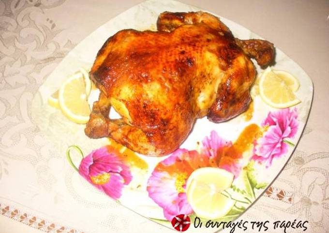 κύρια φωτογραφία συνταγής Χριστουγεννιάτικο κοτόπουλο γεμιστό με λεμόνι