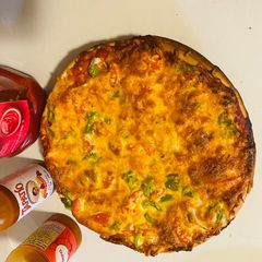 A picture of Easy pesy minutes made Cheesy Pizza 🍕.