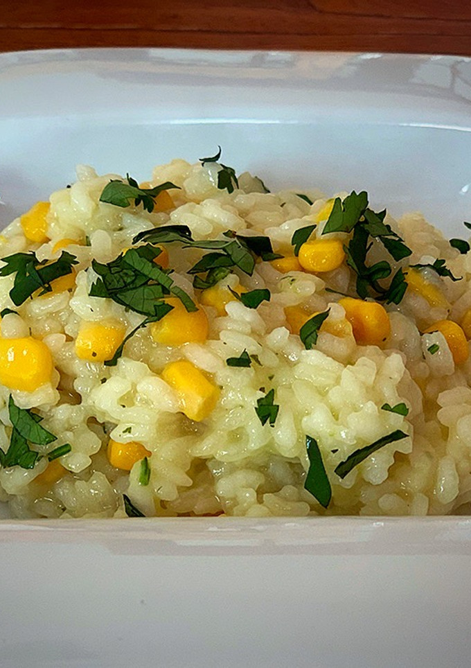 Una foto de Arroz con millo y cilantro