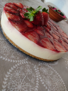 Una foto de Tarta de queso y fresas