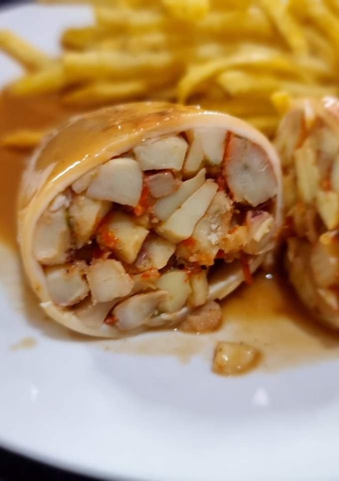 Una foto de Calamares rellenos de mariscos