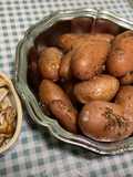 Pommes de terre au diable, ail confit et herbes aromatiques