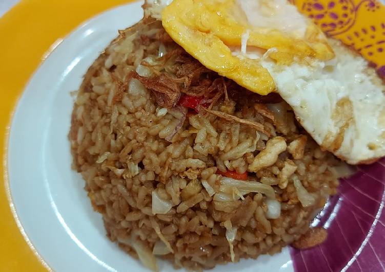 Bagaimana Membuat Nasi Goreng Abang abang yang Enak