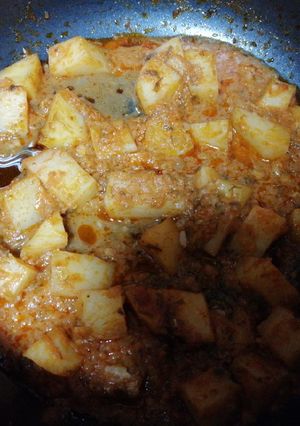صورة لوصفة صينيه بطاطس بالسيبيا (حبار)