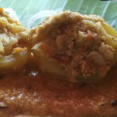 A picture of Nawabi Cabbage paneer stuffed aloo with gravy.