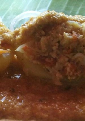 A picture of Nawabi Cabbage paneer stuffed aloo with gravy.