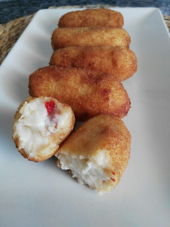 Una foto de Croquetas de jamón y pimientos del piquillo