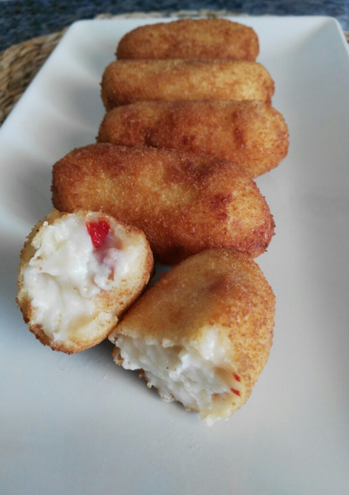 Una foto de Croquetas de jamón y pimientos del piquillo