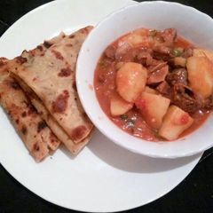 A picture of Stewed Beef and Chapati.