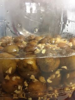 Hình của món Sấu ngâm đường gừng.
