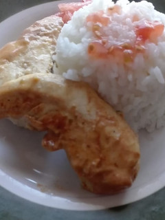 Una foto de Pollo al limón en vapor con arroz