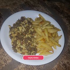 A picture of Fried irish potatoes with minced meat and egg sauce.