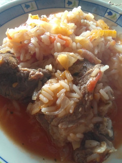 Una foto de Arroz con repollo en salsa de tomate