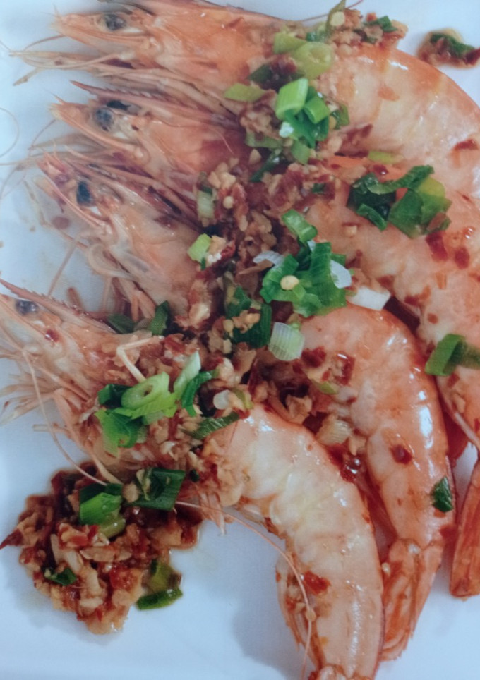 Una foto de Gambas al ajillo con pimienta