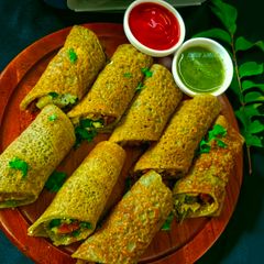 A picture of Stuffed Moong Dal Wrap - Veggie & Paneer Stuffed Moong Dal Wrap.