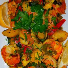 A picture of Mike's Saffron Lobster, Jumbo Scallops & Shrimp Vegetable Melody.
