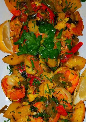 A picture of Mike's Saffron Lobster, Jumbo Scallops & Shrimp Vegetable Melody.