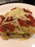 Creppe sin tacc de ricotta, achicoria y salsa pomodoro.