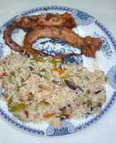 Pulpo en salsa y arroz salteado con verduras