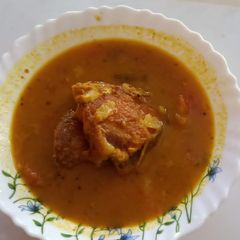 A picture of Assamese Tomato Aloo Fish Curry.