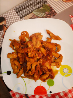 Una foto de Tiritas de pollo a la sidra en reducción de salsa de soja