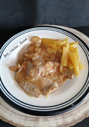 Una foto de Filetes de cabeza de lomo al ajillo