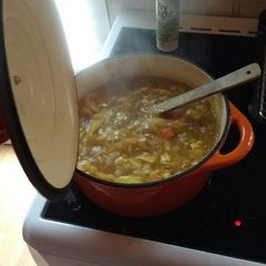 A picture of Curried potato and chicken soup.