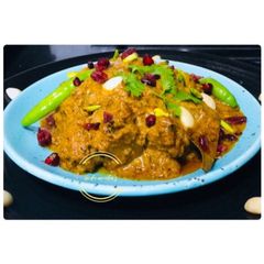 A picture of Flavourful Badami Gosht Korma.