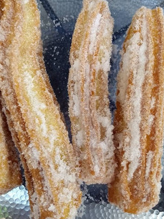 Una foto de Churros rellenos de dulce de leche