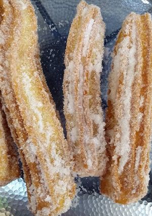 Una foto de Churros rellenos de dulce de leche