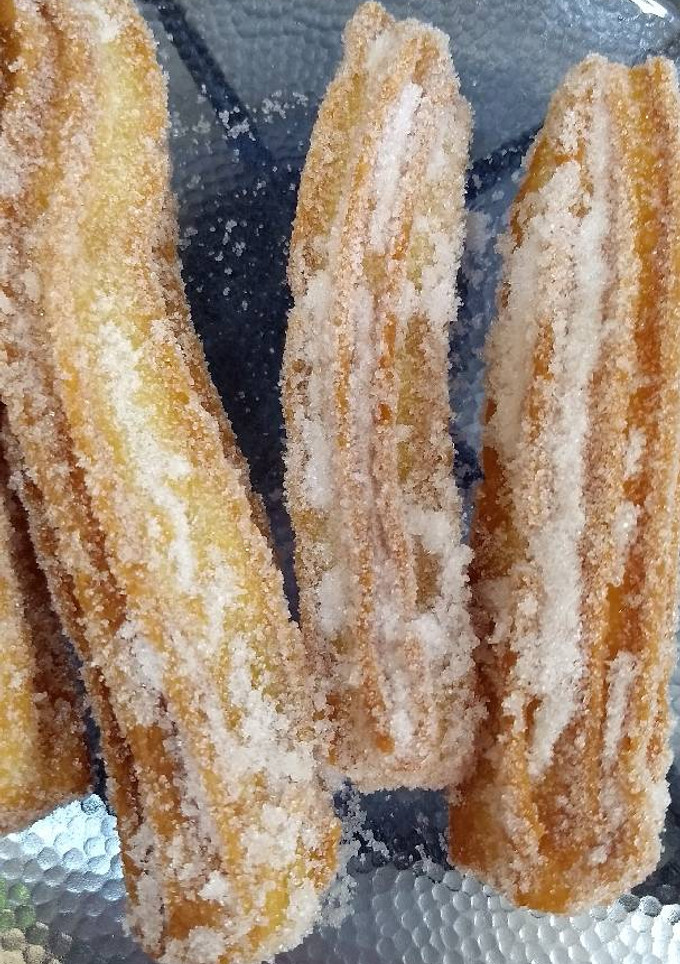 Una foto de Churros rellenos de dulce de leche