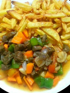 A picture of Chips and liver sauce.