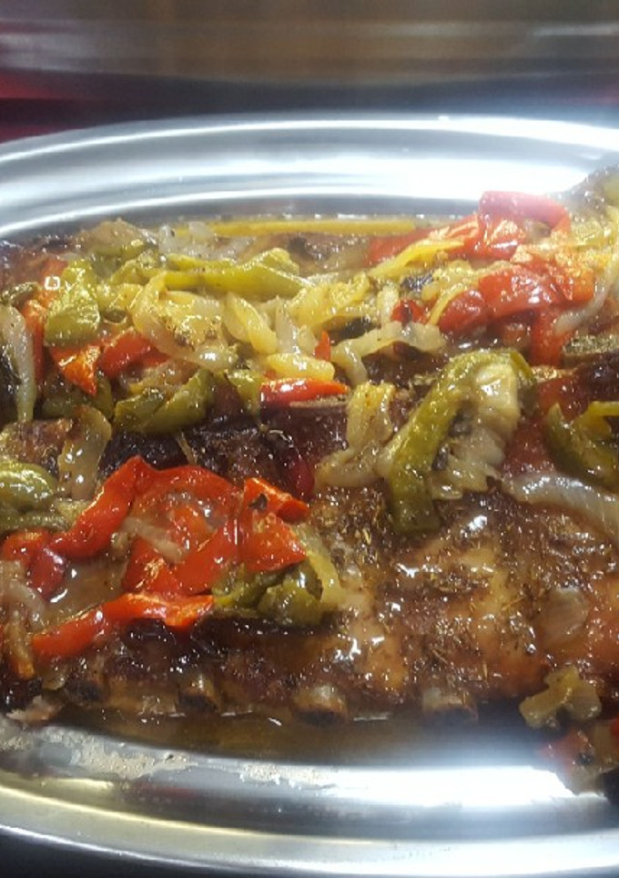 Una foto de Costillar al horno con verduras