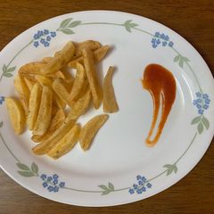 A picture of Potato wedges.