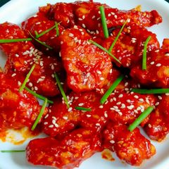 Korean Fried Chicken | Crispy Korean Fried Chicken With Spicy Sauce | Red Sauce Fried Chicken A picture of Korean Fried Chicken | Crispy Korean Fried Chicken With Spicy Sauce | Red Sauce Fried Chicken.