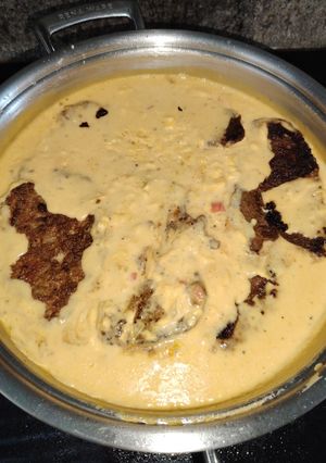 Una foto de Lomo en Salsa Cheddar