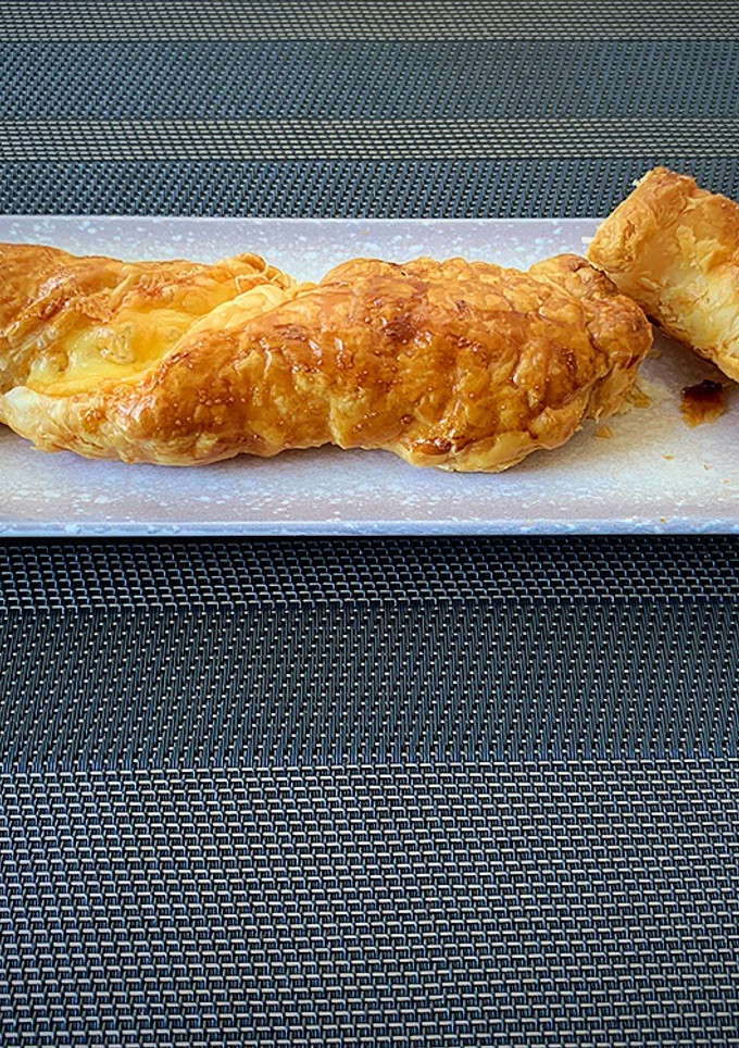 Una foto de Rulos de bacon con queso