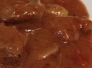 Una foto de Guiso de Secreto Ibérico de Cerdo a la Cerveza con Portobellos