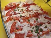 A picture of meat in oven