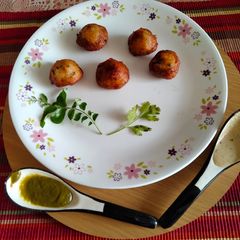 A picture of Magic with stuffed gol gappe - Fusion of North Indian Gol gappe and South Indian Dosa batter.