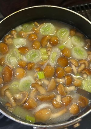 A picture of Miso Soup with Nameko Mushrooms and Green Onions.