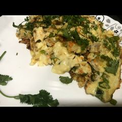 A picture of Veg Omelette stuffed with veg mayonnaise.