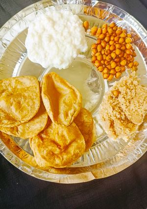 A picture of Halwa, Poori, and Kheer.