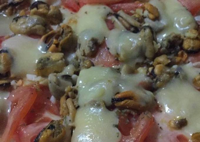 Pizza con mariscos Receta de Mariela Rea- Cookpad