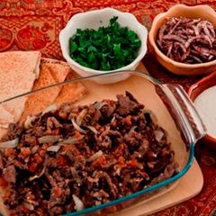 A picture of Marinated and baked beef strips - shawarma lahmeh.