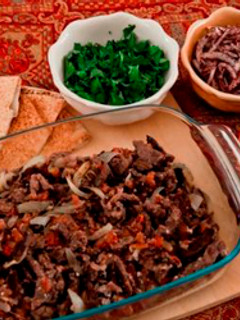 A picture of Marinated and baked beef strips - shawarma lahmeh.