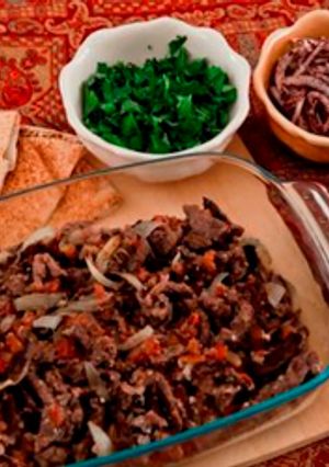 A picture of Marinated and baked beef strips - shawarma lahmeh.